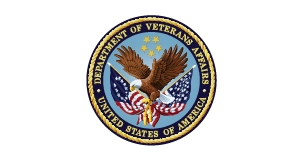 The official seal of the U.S. Department of Veterans Affairs, featuring an eagle, American flags, five gold stars, and a blue background with gold text.