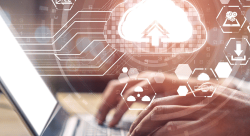 Hands typing on a laptop keyboard with digital cloud computing and data upload icons overlayed, representing cloud technology and online data management.