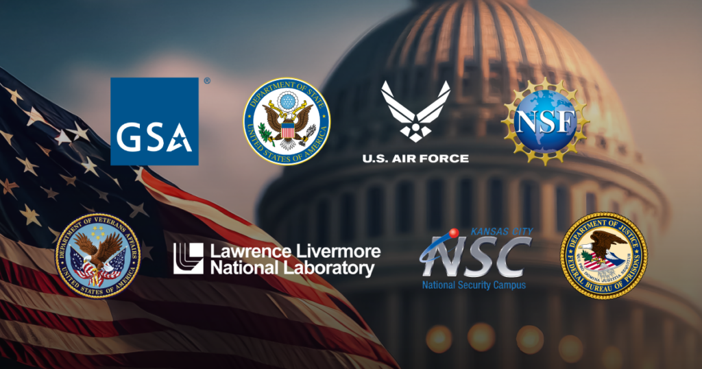 Logos of GSA, U.S. Air Force, NSF, Department of State, DOE, Lawrence Livermore National Lab, NSC, and DOJ over a U.S. flag with the Capitol dome in the background.