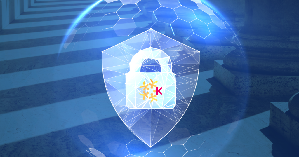 A digital shield with a padlock featuring a sun and “K” symbol, overlaid by hexagonal patterns and a blue-tinted background with columns, representing cybersecurity or data protection.