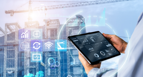 A person holds a tablet displaying data charts and graphs, with digital icons overlaying the image. In the background, there’s a construction site with cranes and a partially built structure.