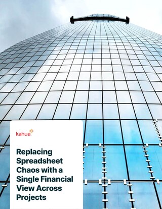A tall glass skyscraper is shown from below. In the foreground, a white text box reads, “Replacing Spreadsheet Chaos with a Single Financial View Across Projects.”.
