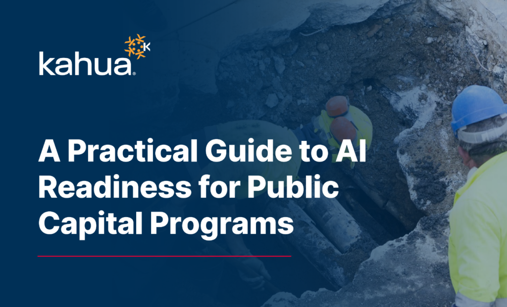 Three construction workers inspect a large pipe in a trench next to text that reads, A Practical Guide to AI Readiness for Public Capital Programs, with the Kahua logo.